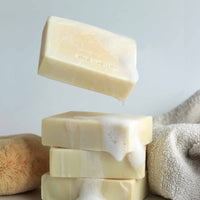 Australian Extra Virgin Organic Olive Oil bar soaps with some suds dripping down